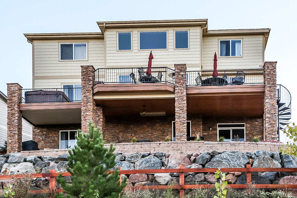 Colorado Creations Stamped Patio Stamped Concrete Spiral Metal Staircase - AFTER