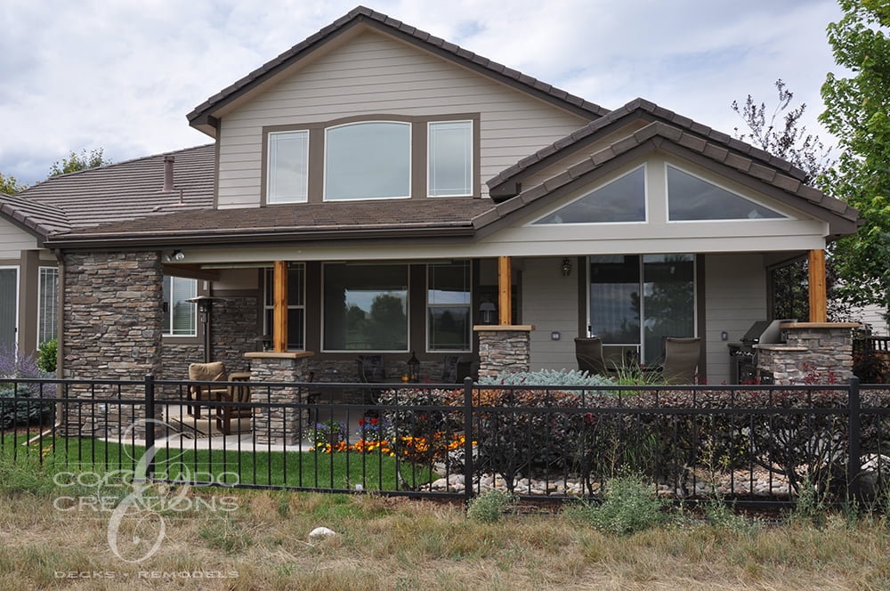 Highlands Ranch Covered Patio with Corner Fireplace and Outdoor Kitchen
