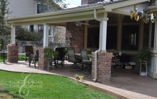 Refined Covered Patio with Grill and Accent Lighting