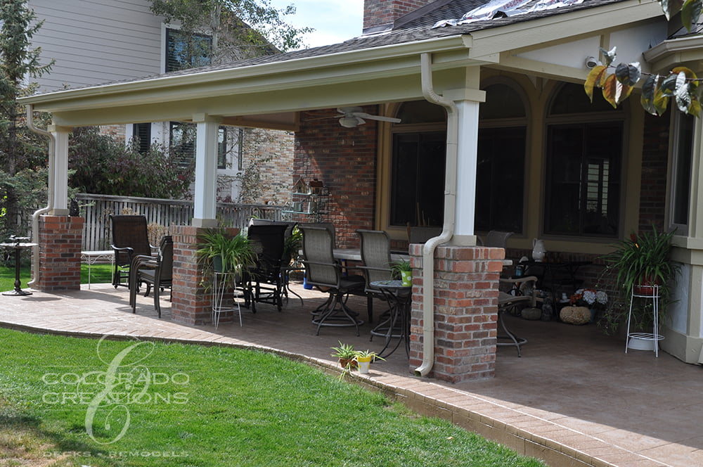 Refined Covered Patio with Grill and Accent Lighting