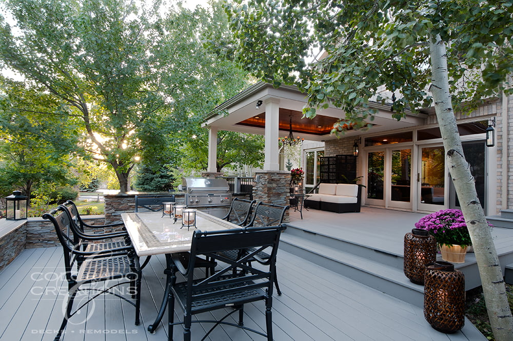 Architectural Covered Deck with Flatstone Accents and Integrated Lighting